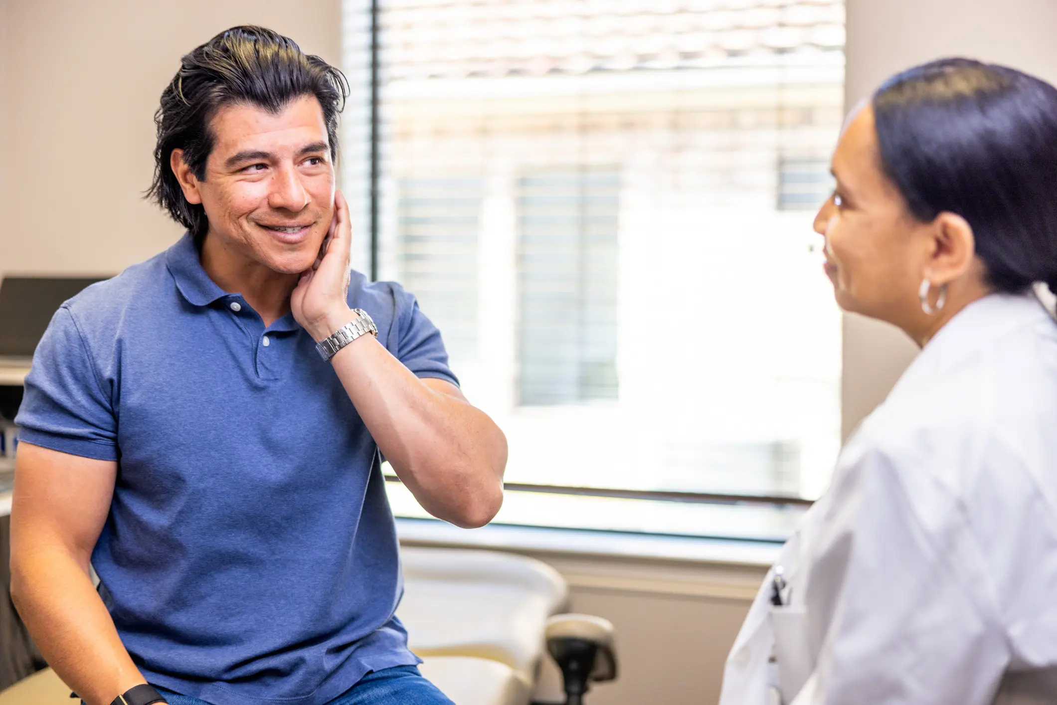 Man at a medical appointment at Prairie Hearing Centre