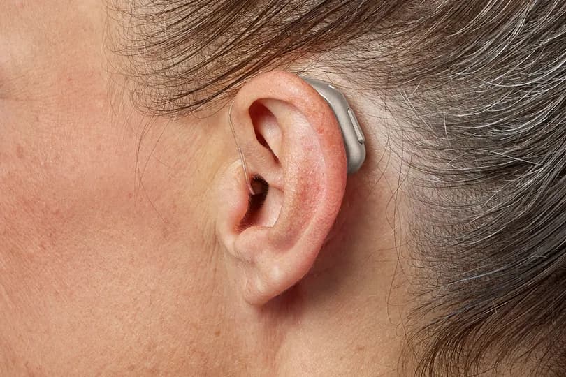 Receiver-In-Canal hearing aid shown in ear