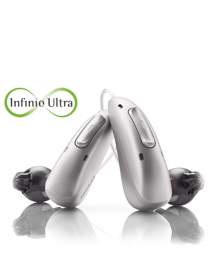 A pair of Phonak Audéo Infinio hearing aids with dome receivers and the Infinio Ultra mark