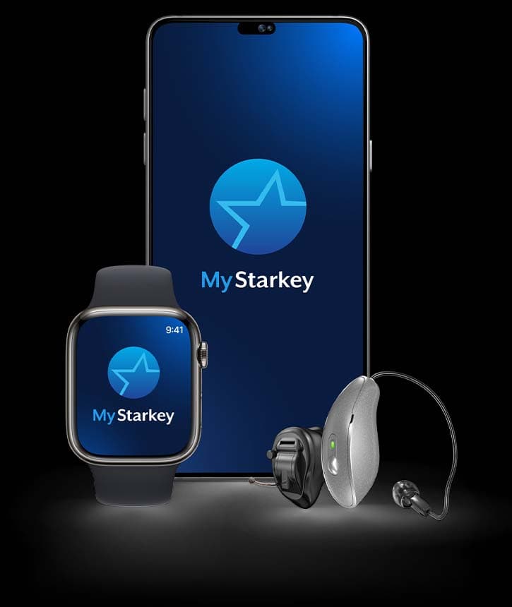 The My Starkey app on a smartphone and smartwatch beside Omega AI hearing aids